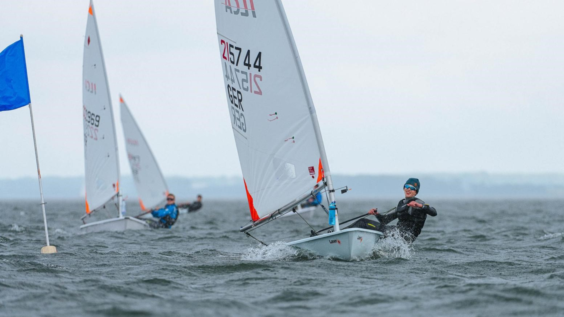 a group of people sailing on water
