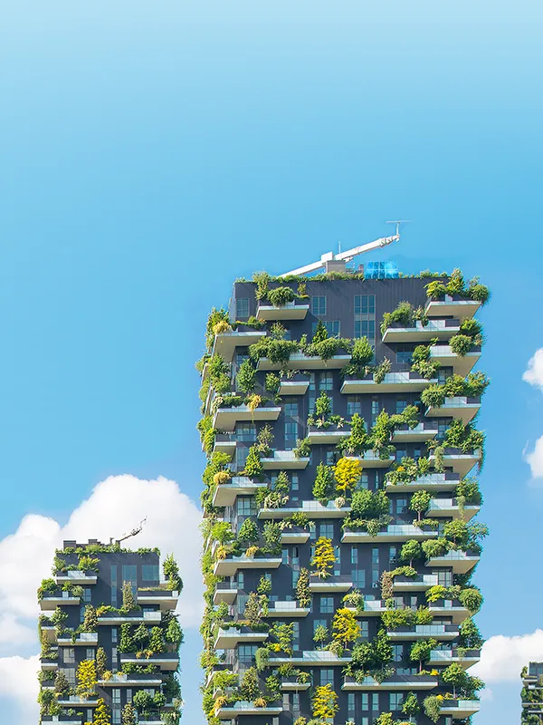 a tall building with plants on it